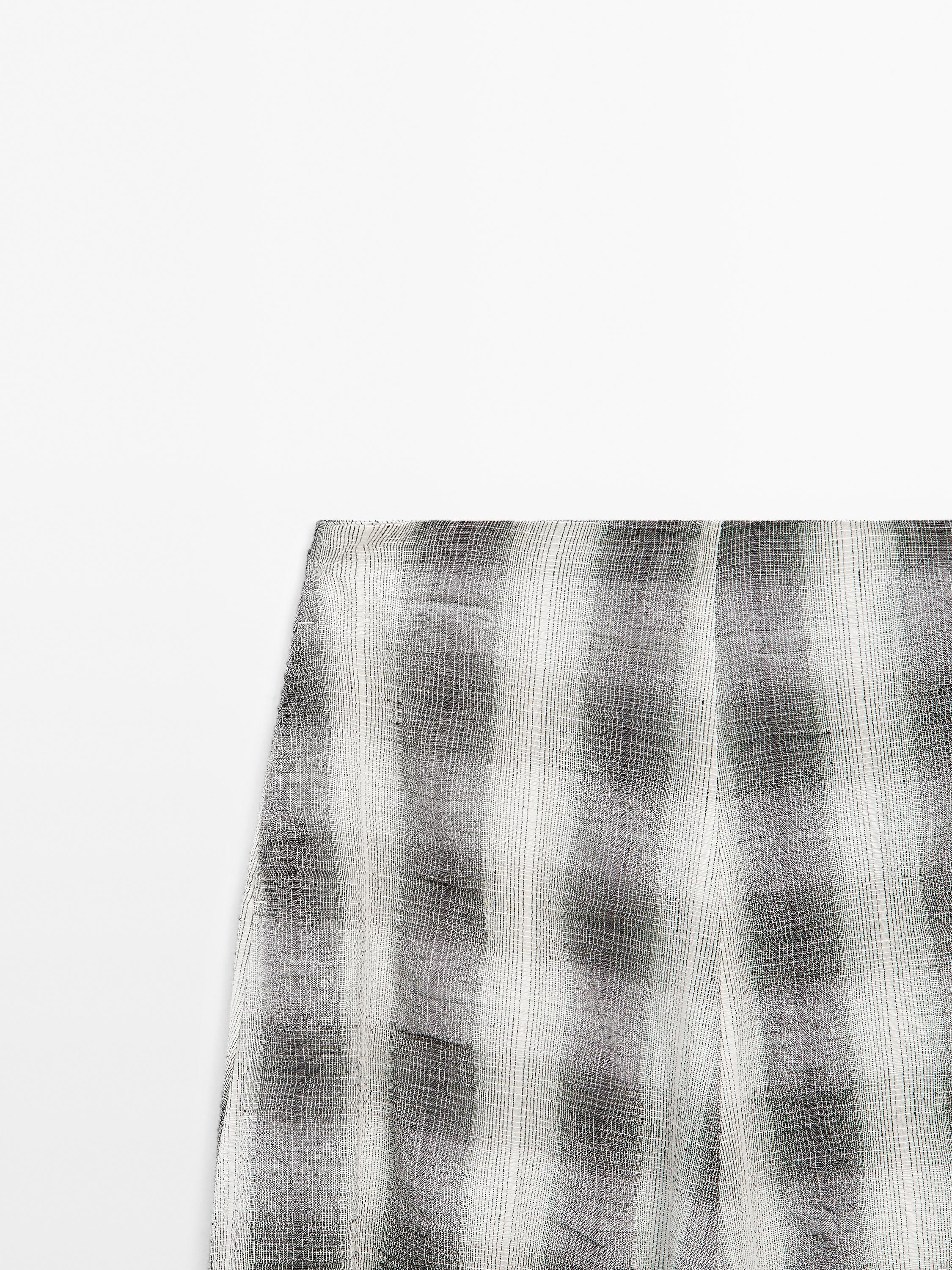 Long flared check skirt